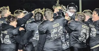  ?? SPECIAL TO THE ST. CATHARINES STANDARD ?? The Niagara Generals celebrate their 2018 Ontario Football League bantam championsh­ip Saturday night in Cambridge.