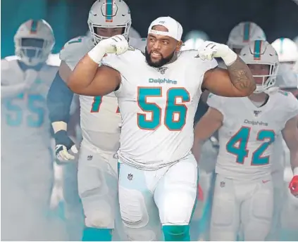  ?? JOHN MCCALL/TNS ?? “Just keep it one day at a time,” said Dolphins defensive tackle Davon Godchaux about the team’s process to improve for the upcoming season.