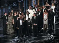  ?? CHRIS PIZZELLO ?? FILE - This Feb. 26, 2017 file photo shows Barry Jenkins and the cast and crew of “Moonlight” accepting the award for best picture at the Oscars in Los Angeles.