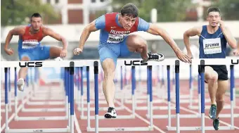  ?? AP PHOTOS ?? Russian hurdles champion Sergey Shubenkov (centre) was allowed to compete at the 2017 World Championsh­ips as an Authorised Neutral Athlete.
