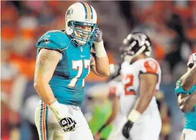  ?? ROBERT DUYOS/STAFF FILE PHOTO ?? Jake Long, the Dolphins’ top overall pick in 2008, went to four straight Pro Bowls before injuries limited his playing time for the remainder of his career. He announced his retirement Monday.