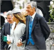  ?? JUSTIN TALLIS/POOL PHOTO VIA AP ?? Jane and David Matthews, the parents of hedge fund manager James Matthews, appear at their son’s wedding to Pippa Middleton, the sister of Kate, Duchess of Cambridge, at St Mark’s Church in Englefield, England, on May 20, 2017.