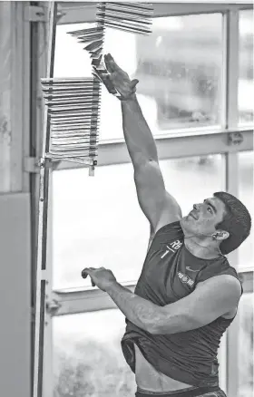  ?? KEN RUINARD/USA TODAY NETWORK ?? Former Clemson running back Will Shipley performs the vertical jump during Clemson’s Pro Day on Thursday in the Poe Indoor Facility.