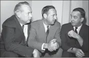  ?? ASSOCIATED PRESS FILE ?? NFL commission­er Pete Rozelle, center, discusses a new television contract for championsh­ip games with Bill MacPhail, left, vice president of CBS, and John Reynolds, president of CBS, in February 1966 in Palm Beach, Fla.