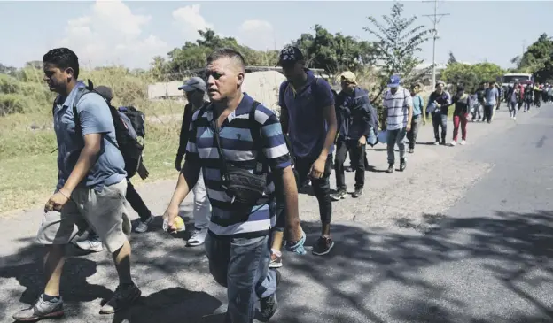  ??  ?? Salvadoran refugees seeking asylum in the US head north – but despite Donald Trump’s rhetoric, the ‘caravan’ is still nearly 1,000 miles away from the US border