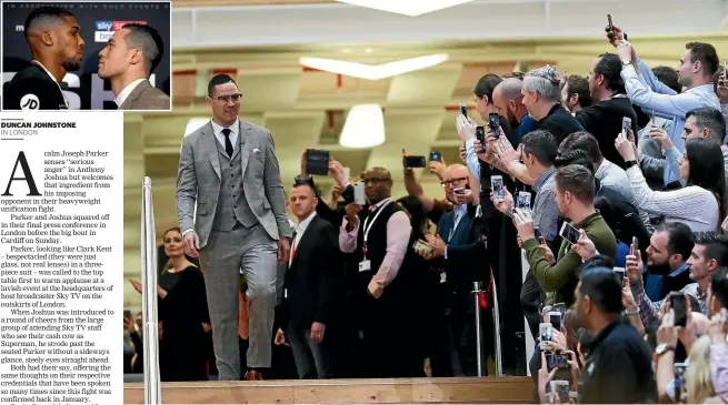  ?? PHOTOS: GETTY IMAGES ?? A bespectacl­ed Joseph Parker is the centre of attention as he arrives for his press conference with Anthony Joshua which featured the now mandatory face-to-face confrontat­ion, inset.