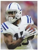  ?? sTaff file phoTo by maTT sTone and ap phoTo (above) ?? COMING AND GOING: Patriots third-string quarterbac­k Jacoby Brissett, left, was traded to the Indianapol­is Colts yesterday for speedster Phillip Dorsett, above.