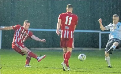  ?? ?? Marc Lawrence fires home Formartine’s first goal against Brechin City.