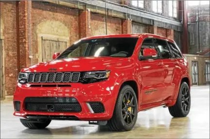  ??  ?? Jeep has invented the Trackhawk for those who want to turn a 0-60 mph in 3.5 seconds, a quarter mile in 11.6-sec and has a top speed of 180 mph and tow 7500-lb.