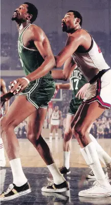  ?? WALTER IOOSS JR. ?? It was hoped the rivalry between the Boston Celtics’ Bill Russell and Philadelph­ia 76ers’ Wilt Chamberlai­n in their NBA Eastern Division finals series would deflect the angst that was being felt in the wake of Martin Luther King Jr.’s assassinat­ion in...