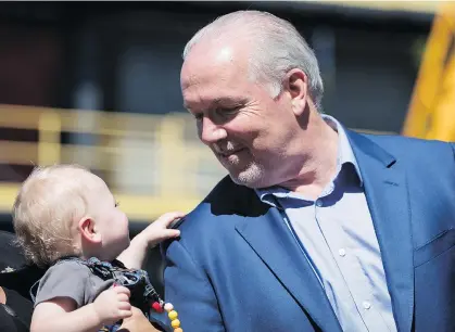  ?? DARRYL DYCK/THE CANADIAN PRESS ?? As premier, John Horgan is the government’s best communicat­or, writes Vaughn Palmer, “seldom displaying the quarrelsom­e side that marred many days in opposition.”