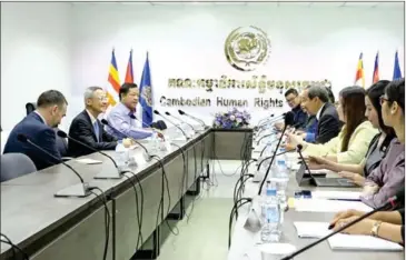  ?? CHRC ?? CHRC president Keo Remy meets with UN special rapporteur Vitit Muntarbhor­n (centre left) on December 5.