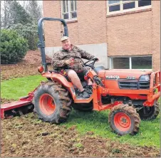  ?? SUBMITTED ?? David Austin tills the ground beside Pictou United Church for its new contemplat­ive garden. The church is in the second phase of constructi­ng the garden which it will have complete in 2019 in honour of the church building’s 55th anniversar­y.