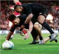  ??  ?? Contender for No7: Ardie Savea celebrates a New Zealand try with Waisake Naholo