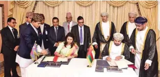  ?? -ONA ?? SIGNING CEREMONY: The Ambassador of Nepal to Oman, Sharmila Parajuli Dhakal, and the head of the West Asia Department at the Ministry of Foreign Affairs of Oman, Shiekh Hilah Marhoon Al Mammari signed the MoU on behalf of the respective government­s.