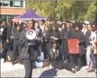  ?? Liz Teitz / ?? Students at the University of Connecticu­t organized a march on campus on Oct. 21 to call on the university to address racism on campus.