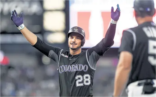  ?? AAron Ontiveroz, The Denver Post ?? The pending trade of star third baseman Nolan Arenado to the St. Louis Cardinals leaves the Rockies with a huge hole in their lineup. Ryan McMahon will likely replace Arenado at third, with Brendan Rodgers getting a chance to prove himself as an everyday player at second base.
