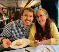  ?? Harrison Keely photo ?? Harrison Keely and his mother, Sherrie Keely, enjoy dessert in an Amtrak dining car in June.