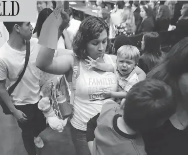  ?? CHIP SOMODEVILL­A/GETTY IMAGES ?? Representa­tives from faith and pro-immigratio­n groups walk out of a Senate Judiciary Committee hearing about the separation of children from their parents at the border on Capitol Hill Tuesday in Washington, D.C.