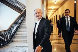  ?? J. SCOTT APPLEWHITE/AP ?? Jeff Sessions leaves his office Wednesday before his confirmati­on as attorney general.