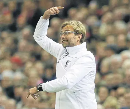  ??  ?? Liverpool manager Juergen Klopp instructs his players during the Europa League game against Bordeaux.