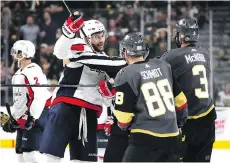  ?? BRUCE BENNETT/GETTY IMAGES ?? Washington Capitals forward Tom Wilson, left, drew the ire of the Vegas Golden Knights with his hit on Jonathan Marchessau­lt during Game 1 of the Stanley Cup final on Monday night.