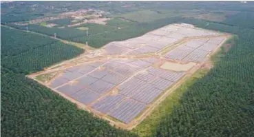  ??  ?? The 30 megawatt plant is equipped with 134,880 solar photovolta­ic panels with 14 inverters. – BERNAMAPIX