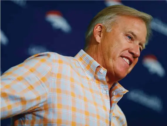  ?? David Zalubowski / Associated Press ?? After Trevor Siemian and Brock Osweiler underwhelm­ed, the heat is on Broncos GM John Elway to find a franchise QB.