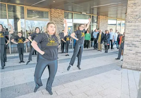  ??  ?? Smart Moves Dance Group perform for the opening of the new Menzieshil­l Community Hub.