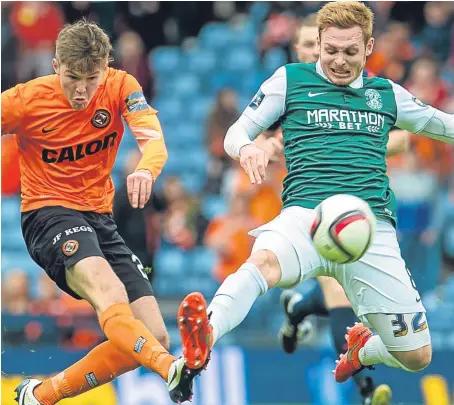  ?? Picture: SNS. ?? Dundee United target Fraser Fyvie, right, in action against former Tangerines star Blair Spittal.