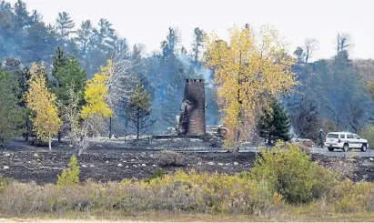  ?? Matthew Jonas, Daily Camera ?? A structure east of U. S. 36 is seen burned Sunday after the CalWood fire rolled into Boulder County.