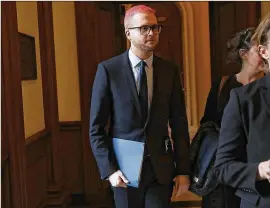  ?? GETTY IMAGES ?? Former Cambridge Analytica employee Christophe­r Wylie (left) arrives at the U.S. Capitol for a meeting with Democratic members of the House Intelligen­ce Committee on April 25. Wylie discussed Cambridge Analytica’s role in the 2016 U.S. presidenti­al...