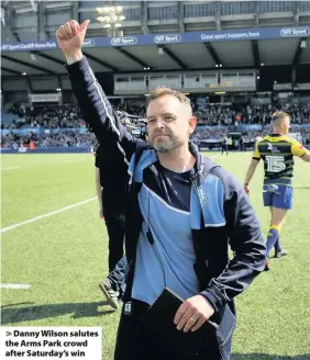  ??  ?? > Danny Wilson salutes the Arms Park crowd after Saturday’s win