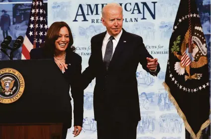  ?? Chip Somodevill­a / Getty Images ?? President Biden and Vice President Kamala Harris discuss the expanded child tax credit in July when payments started.