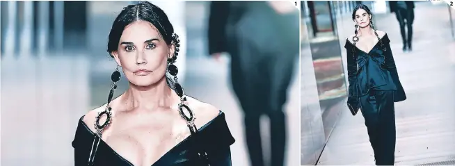  ?? FOTO: AFP ?? (1) El rostro de Demi fue tendencia durante el jueves en las redes sociales. (2) La exesposa de Bruce Willis modeló para Fendi en la Semana de la Alta Costura.