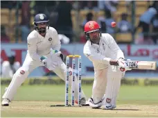  ?? AP ?? Afghanista­n’s batsmen have a reputation for street-cricket slogs, and they learnt a lesson on being patient against India