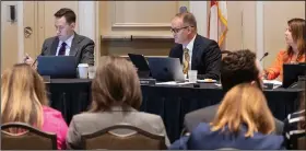  ?? (AP/Orlando Sentinel/Willie J. Allen Jr.) ?? State Board of Education members Ben Gibson (left), Ryan Petty and Kelly Garcia meet Wednesday in Orlando, Fla., to make a decision on whether to adopt a number of rules required by new state laws.