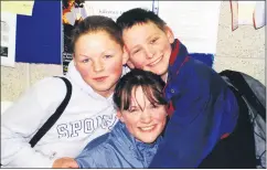  ?? ?? Brother and sister Desmond and Patricia O’Keeffe, Beechfield, Fermoy, with their Rathcormac cousin Aisling, enjoying themselves in Fermoy Leisure Centre 21 years ago.