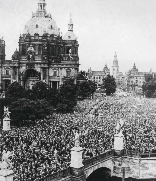  ??  ?? A demonstrat­ion against the Treaty of Versailles, organised by the Nazi party, in Berlin on 28 June 1933. By the early 1930s, a third of Germany’s workforce was unemployed and the banking system was in ruins, leaving the country open to nationalis­t bombast