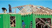  ?? ARCHIVES] [PHOTO BY SARAH PHIPPS, THE OKLAHOMAN ?? Framers work on a house on NW 191 Street in Edmond’s Rushbrook addition in 2016.