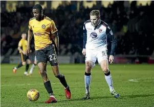  ?? GETTY IMAGES ?? Morecambe’s Kiwi centreback Steven Old, right, scored two goals in regulation time and slotted a penalty in a shoot-out League Cup win over Mansfield Town.