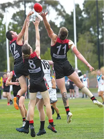  ?? ?? Three Gulls fly for a mark late in the second quarter of the match at Western Park between Warragul and Wonthaggi.