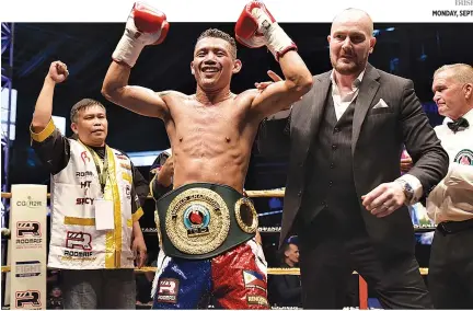  ?? MIKE MIGUEL/RealFight.PH ?? FILIPINO IBO WORLD BANTAMWEIG­HT CHAMPION MICHAEL DASMARIÑAS will make his first title defense against Manyo Plange of Ghana on Sept. 29 in Singapore.