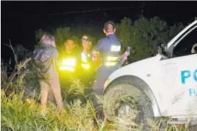  ?? REINER MONTERO ?? Agentes judiciales y de la Fuerza Pública revisaron la escena del crimen. El presunto agresor se encuentra detenido