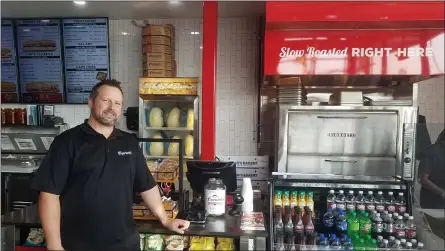  ?? DONNA ROVINS — MEDIANEWS GROUP ?? Co-owner Heath Mitchem at the counter of Capriotti’s Sandwich Shop’s new location has opened a new location. Mitchem and his wife, Cindy, already operate a Capriotti’s in West Whiteland and plans to open a third in the Grove Shopping Center in East Whiteland.