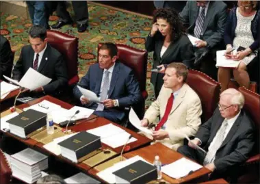  ?? MIKE GROLL — THE ASSOCIATED PRESS ?? Independen­t Democratic Conference members David Carlucci, D-Nanuet, Jeffrey Klein, D-Yonkers, Sen. Diane Savino, D-Staten Island, Sen. David Valesky, D-Syracuse, and Sen. Tony Avella, D-Queens, in the Senate Chamber at the Capitol on Tuesday, June 10,...