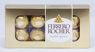  ?? (Stefano Rellandini/illustrati­on/Reuters) ?? A BOX OF Ferrero Rocher chocolates is seen last year. Many of Giovanni Ferrero’s acquisitio­ns have propelled the company into candy, or sweets, and away from its traditiona­l chocolate roots.