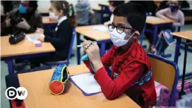  ??  ?? Face masks are compulsory for all students in French schools