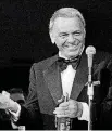  ?? [AP FILE PHOTO] ?? Frank Sinatra appears May 18, 1977, on the stage of the Westcheste­r Premier Theater in Tarrytown, N.Y., during the opening night of his act with Dean Martin. Sotheby’s will auction scores of items that belonged to Frank Sinatra and his wife of 22 years, Barbara.