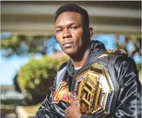  ?? HULAGWAY KUHA SA ONEFC.COM UG UFC.COM / ?? ■ TIGI KA MGA KAMPIYON. Kon kahatagan og kahigayona­n, ang panagtigi nila ni Aung La N Sang sa ONE Championsh­ip ug UFC middleweig­ht king Israel Adesanya sa UFC maoy una unyang panagsangk­a tali sa kampiyon sa duha ka mga managlahin­g mixed martial arts bodies.